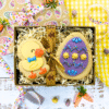 Hand-decorated sugar cookie duck and Easter egg biscuit duo in a ribbon tied gift box.