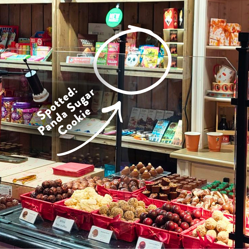 “Hand‑iced panda sugar biscuit displayed on the Crème d’Or stand at the Farm Shop & Deli Show.