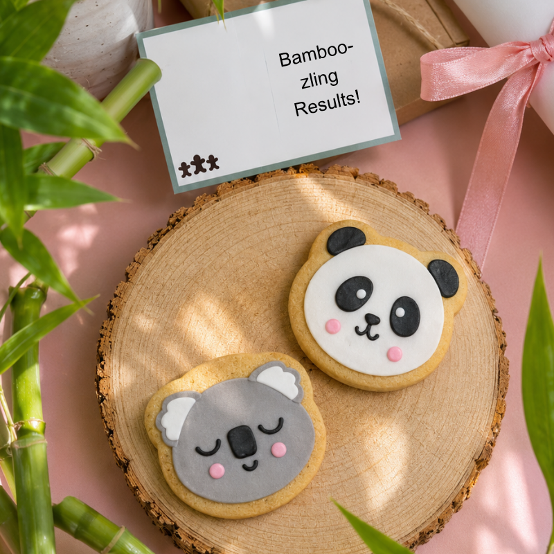 Hand-iced panda and koala biscuits with "Bamboo-zling Results" message card, a fun and thoughtful biscuit gift for celebrating exam achievements.
