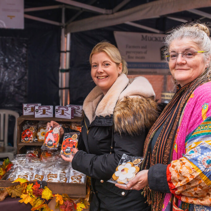 Original Biscuit Bakers and Billington's Gingerbread stand showcasing hand-iced biscuits and heritage gingerbread at the Ginger & Spice Festival in Market Drayton.